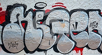 graffiti painted on public wall Editorial Stock Photo