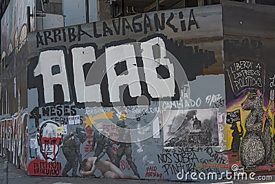 Graffiti of the political unrest and protests in Santiago, Chile Editorial Stock Photo