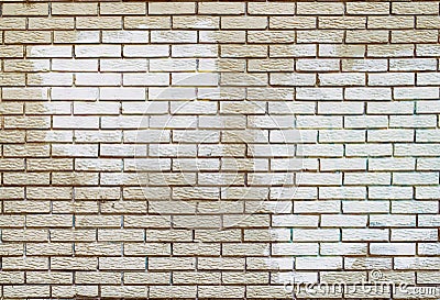 Graffiti removal with white paint over covering on brick wall Stock Photo