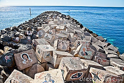 Graffiti on a stones of a breakwater in Santa Cruz de Tenerife, Editorial Stock Photo