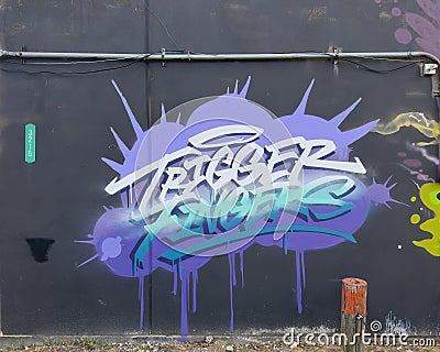 Graffiti style title mural for 2023 Trigger Fingers event at 3215 Hickory Street in Deep Ellum, Texas. Editorial Stock Photo