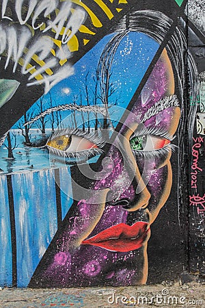 Graffiti of unidentified artist on the wall of the Batman Alley Editorial Stock Photo