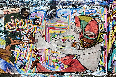 Graffiti of unidentified artist on the wall of the Batman Alley Editorial Stock Photo