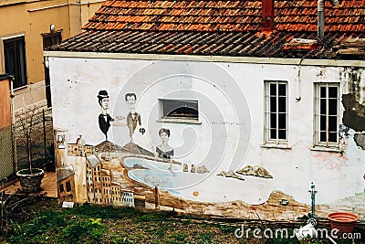 Graffiti on the walls of houses in Rimini Editorial Stock Photo