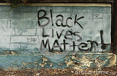 Grafitti message signs on cement wall by sidewalk. Black Lives Matter, Every Life, Stop the Violence. Editorial Stock Photo