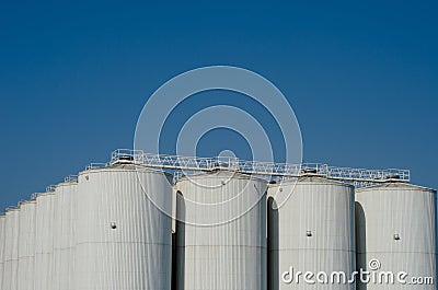 A grain elevator is an agrarian facility complex designed to stockpile or store grain. Stock Photo