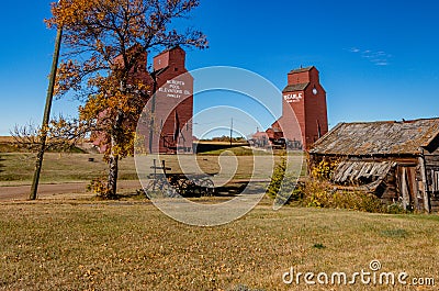 Grain elevators and farm buildings in Rowley Alberta Canada Editorial Stock Photo