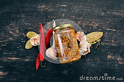 Grain Mustard. Spices On a white wooden background. Stock Photo