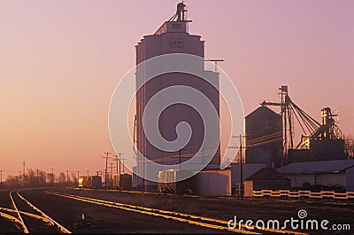 Grain silo co-op in KS at sunset Editorial Stock Photo