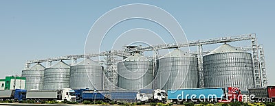 Grain silos Grain terminal. Agriculture business. Summer harvest Stock Photo