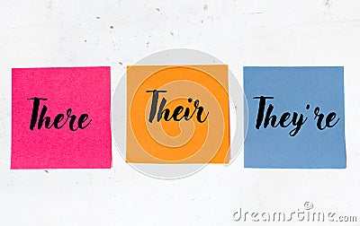 Grammar of there, their, they`re on three sticky notes Stock Photo