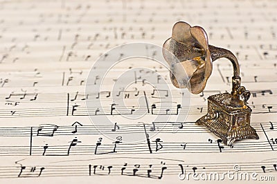 Gramophone on old sheet music Stock Photo