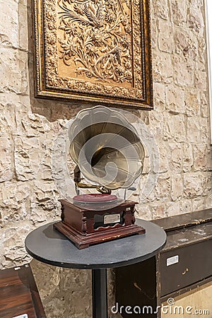 A gramophone or since the 1940s called a record player, is a device for the mechanical recording and reproduction of sound. Editorial Stock Photo