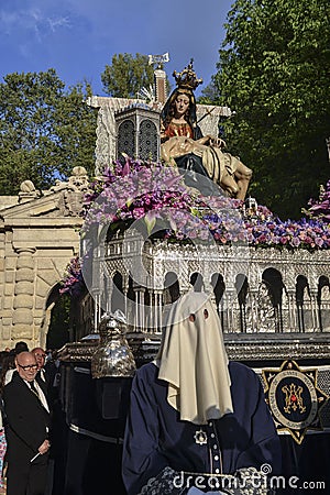 Granada, Spain; April 19, 2014: Image in procession of Santa MarÃ­a de la Alhambra with a sad face and her son Jesus Christ in her Editorial Stock Photo