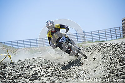 GRANADA, SPAIN - JUNE 30: Unknown racer on the competition of the mountain downhill bike Bull bikes Cup DH 2013, Sierra Nevada Editorial Stock Photo