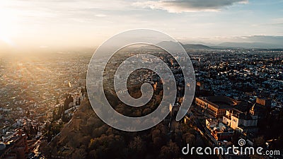 GRANADA.SPAIN-March 4:Famous spanish monument,the Alhambra palace aerial view at sunset.Fortress located Granada,Andalusia,Spain. Editorial Stock Photo