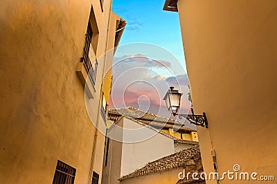 Granada streets and Spanish architecture in a scenic historic city center Stock Photo