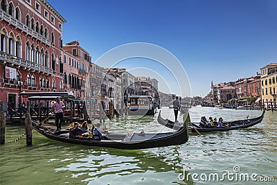 The Grand canal and gondolas with tourists, Venice Editorial Stock Photo