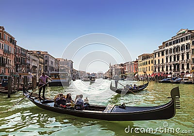 The Grand canal and gondolas with tourists, Venice, Editorial Stock Photo