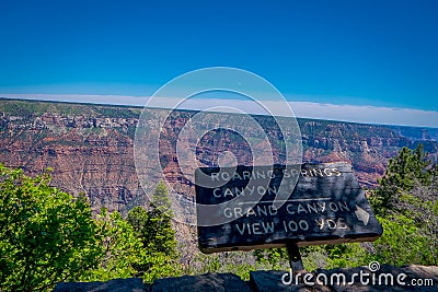 Grand Canyon,Arizona USA, JUNE, 14, 2018: Outdoor view of informative sign of roaring spring canyon in a wooden Editorial Stock Photo