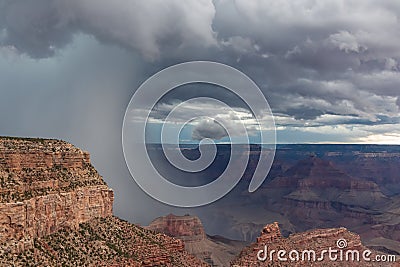 Grand Canyon - Dark clouds emerging to rain storm seen from the Bright Angel Point at South Rim, Arizona, USA Stock Photo