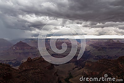 Grand Canyon - Dark clouds emerging to rain storm seen from the Bright Angel Point at South Rim, Arizona, USA Stock Photo