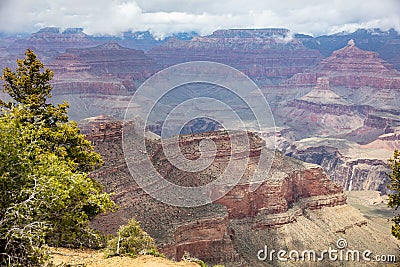 Grand Canyon, Arizona, USA. Overlook of the red rocks, cloudy sky background Stock Photo