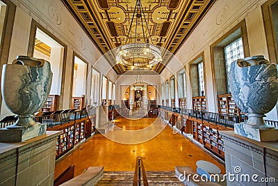 Grand Library Interior with Ornate Chandeliers and Marble Urns Editorial Stock Photo