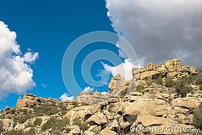 Craggy cliffs and a small waterfall atop Grand Mesa Stock Photo