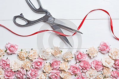 Grand opening concept with scissors cutting red ribbon on white Stock Photo