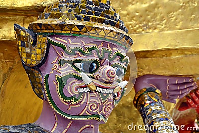 The Grand Palace in Bangkok, Thailand. Statue of giant demon guardian. Stock Photo