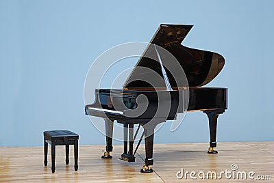 Grand piano in concert hall Stock Photo