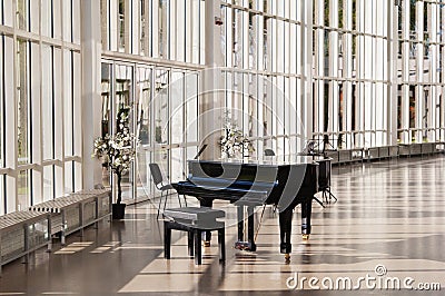 Grand piano in the hall Stock Photo