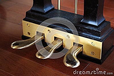 Grand piano pedals close up Stock Photo