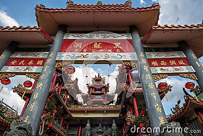 A grand scenic traditional colourful chinese Black Dragon Cave temple in Yong Peng; Johor, Malaysia Editorial Stock Photo