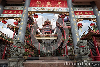 A grand scenic traditional colourful chinese Black Dragon Cave temple in Yong Peng; Johor, Malaysia Editorial Stock Photo
