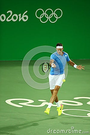 Grand Slam Champion Juan Martin Del Porto of Argentina in action during men`s singles first round match of the Rio 2016 Olympics Editorial Stock Photo