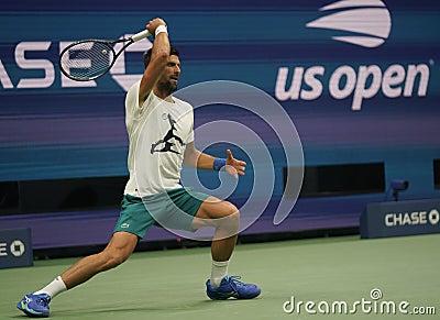 Grand Slam Champion Novak Djokovic of Serbia during practice at the 2023 US Open at Billie Jean King National Tennis Center Editorial Stock Photo