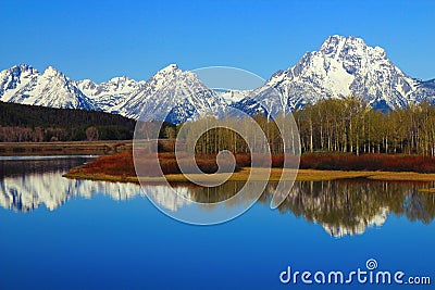 Rocky Mountains Range reflected in Oxbow Bend of the Snake River, Grand Teton National Park, Wyoming Stock Photo