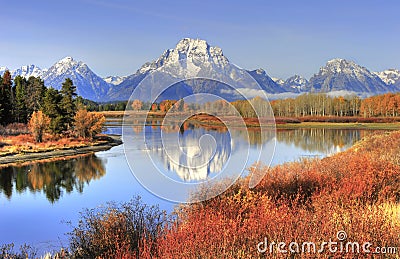 Grand Teton ranges backdrop to fall colors along Snake River, Gr Stock Photo