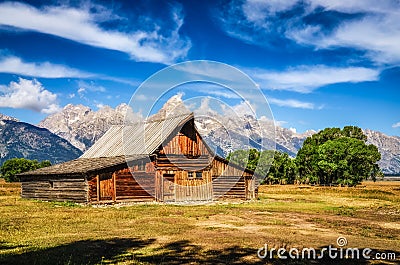 Grand Teton scenic view with abandoned barn on Mormon Row Stock Photo