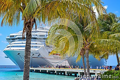 Grand Turk, Turks and Caicos Islands - April 03 2014: Carnival Cruise Ships side by side at the Grand Turk Cruise Center Editorial Stock Photo