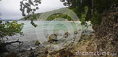 People taking ocean bath on the beautiful beach of Petit Havre beach in south on Grande-Terre on Guadeloupe island Editorial Stock Photo