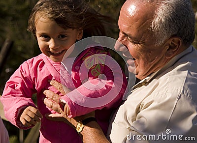 Grandfather and granddaughter Stock Photo