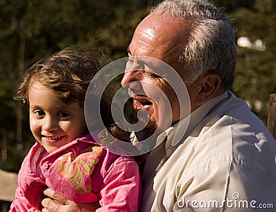 Grandfather and granddaughter Stock Photo