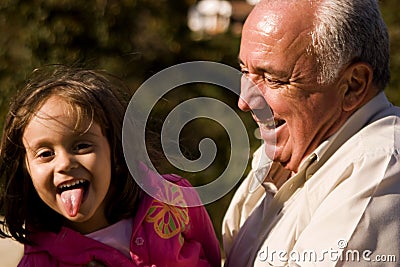 Grandfather and granddaughter Stock Photo