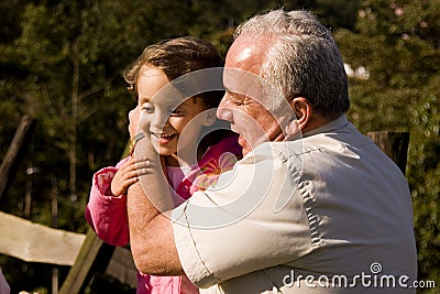 Grandfather and granddaughter Stock Photo