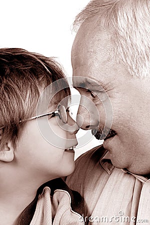Grandfather grandson forehead Stock Photo