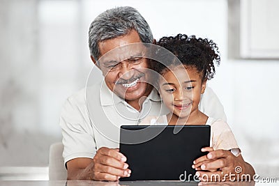 Grandfather, learning and girl with tablet in home for streaming video, movie or social media. Bonding, touchscreen and Stock Photo
