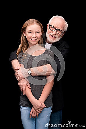 Grandfather and teenage granddaughter Stock Photo